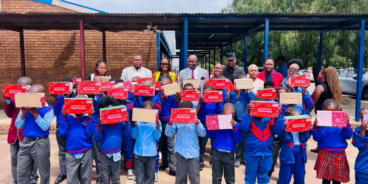 Cllr Tracy Seimela donates school shoes in eMbalenhle