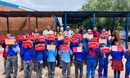 Cllr Tracy Seimela donates school shoes in eMbalenhle